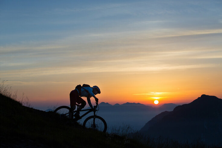 © NLW / David Schultheiß Biken bei Sonnenuntergang